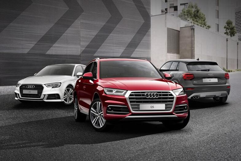blue audi A3, A4 Avant and A4 sedan on bridge