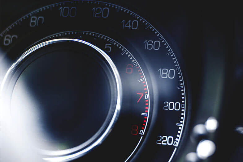 close up of a speedo and odometer